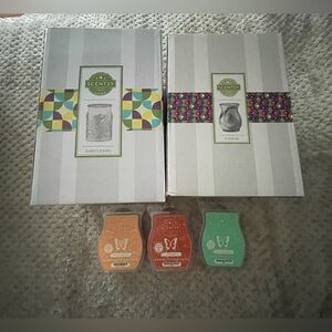 3 wax warmers and 3 full wax melt bars (Scentsy)